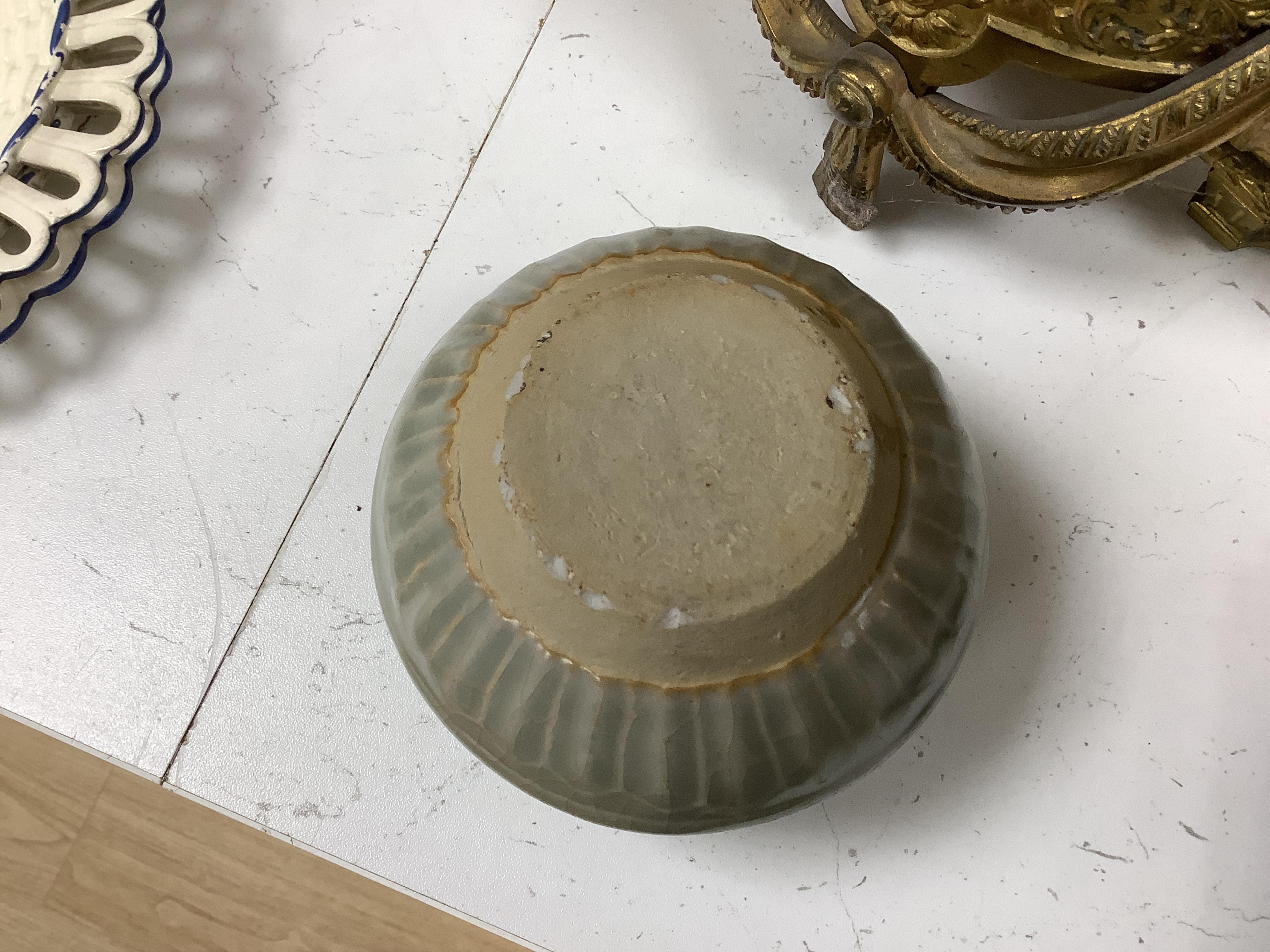 A group of four Chinese Celadon wares - two vases and two dishes, tallest vase 16cm.